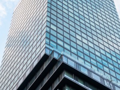 Bottom-up vertical view of a skyscraper in Frankfurt downtown, Germany.